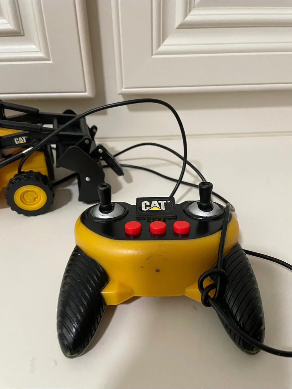 Yellow Remote-Control Backhoe Loader Toy not working works manually
